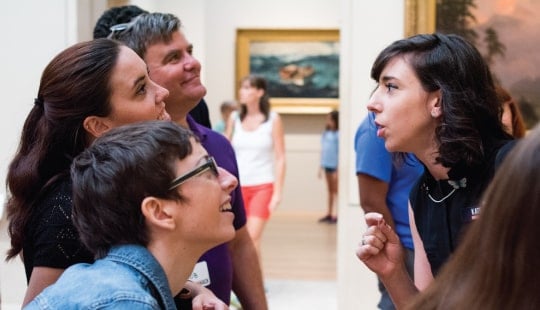 Tour guide sharing a story with guests