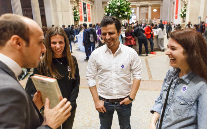 A group of adults laughing.